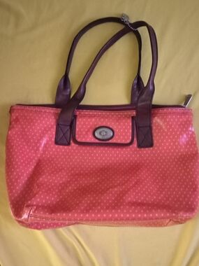 Fossil Key-Per crossbody bag, a vintage-style handbag line often made from coate